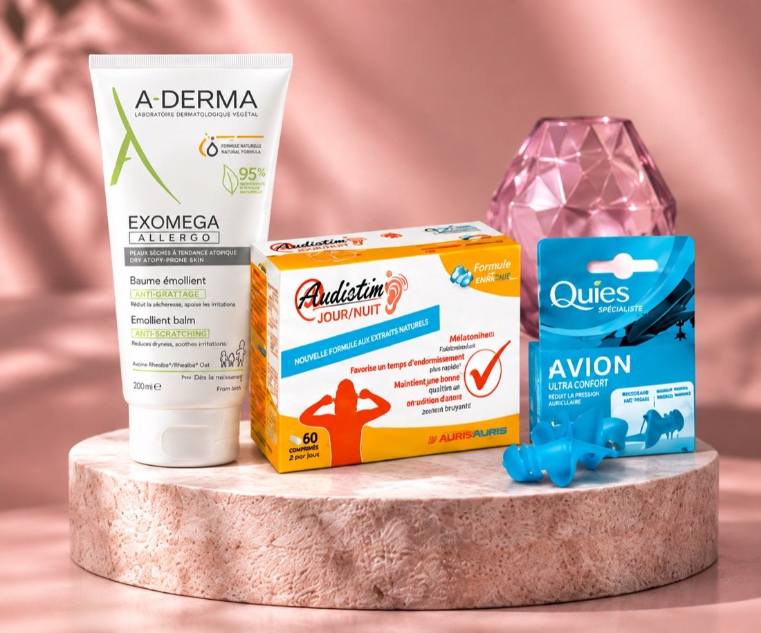 Sélection de soins et accessoires A-Derma, Audistim et Quies sur un socle rose